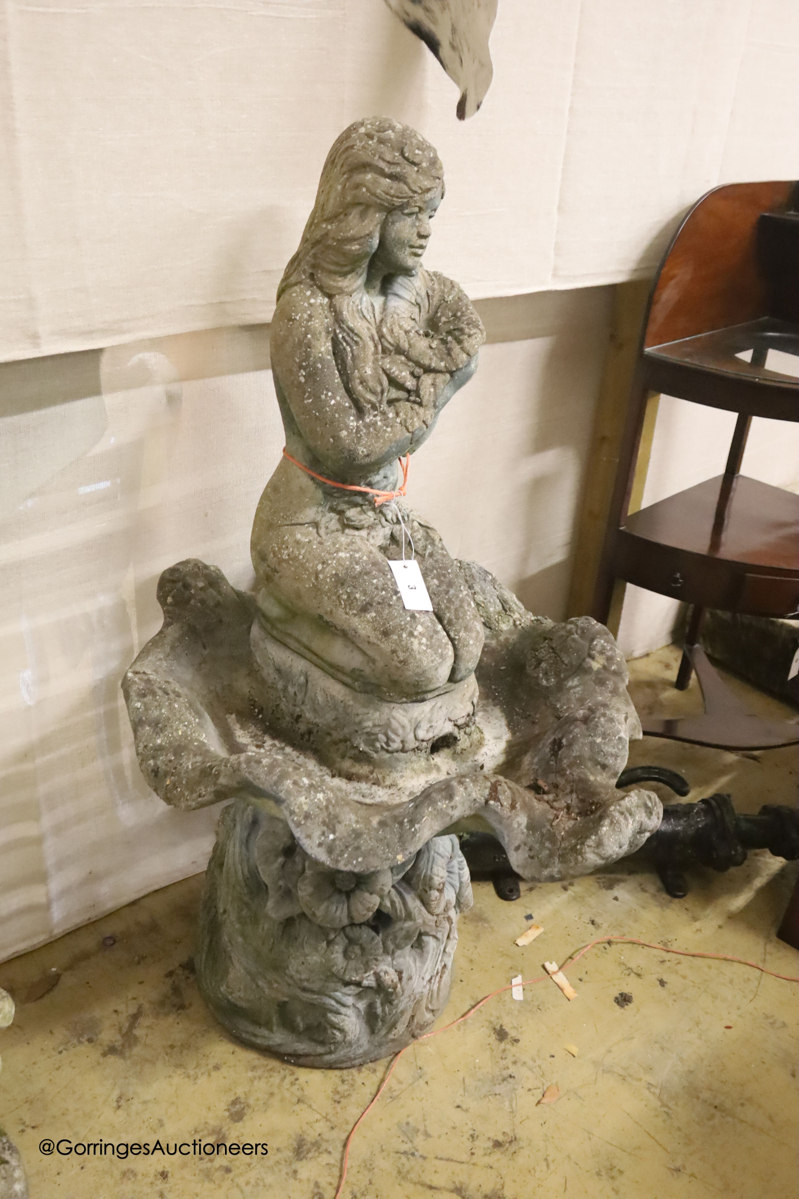 A reconstituted stone figural garden fountain, height 116cm